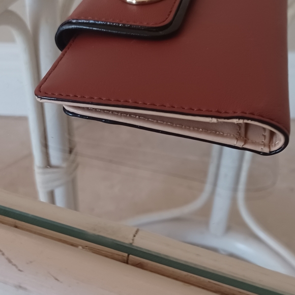 Kate Spade Brown leather turn lock wallet with wrist handle . Approx 7 5 inches - Picture 10 of 12